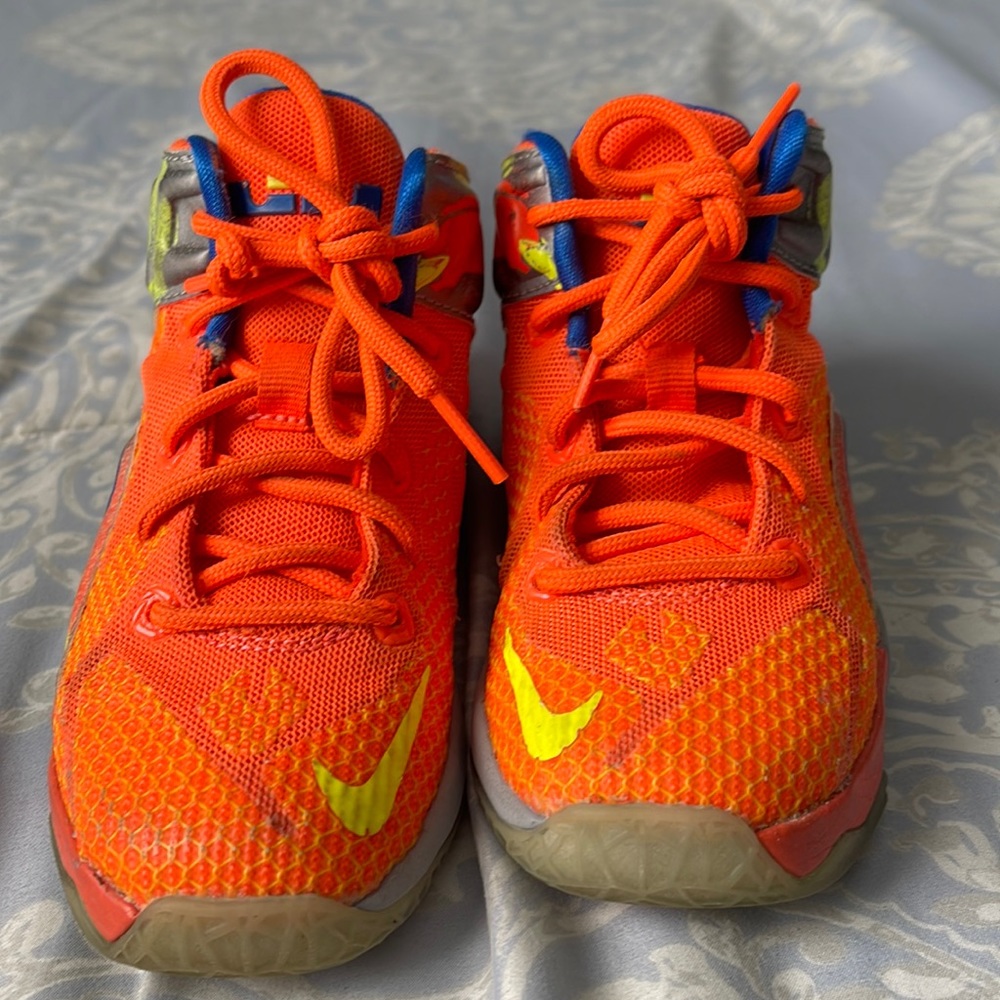 Bright orange and yellow shoes in ok condition.